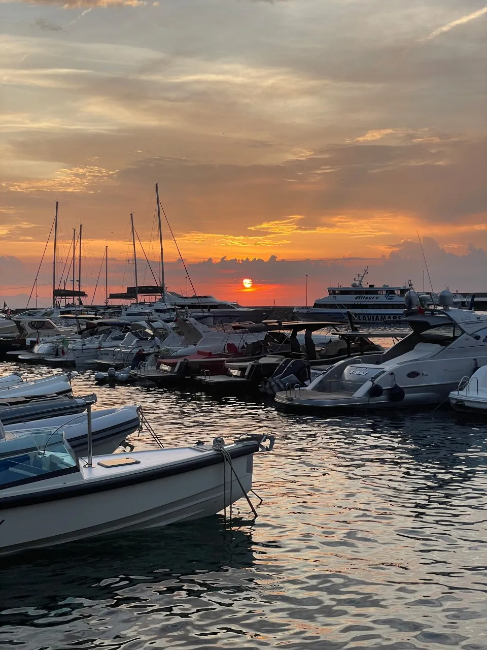 Limestone cliffs & sunset aperitif aboard